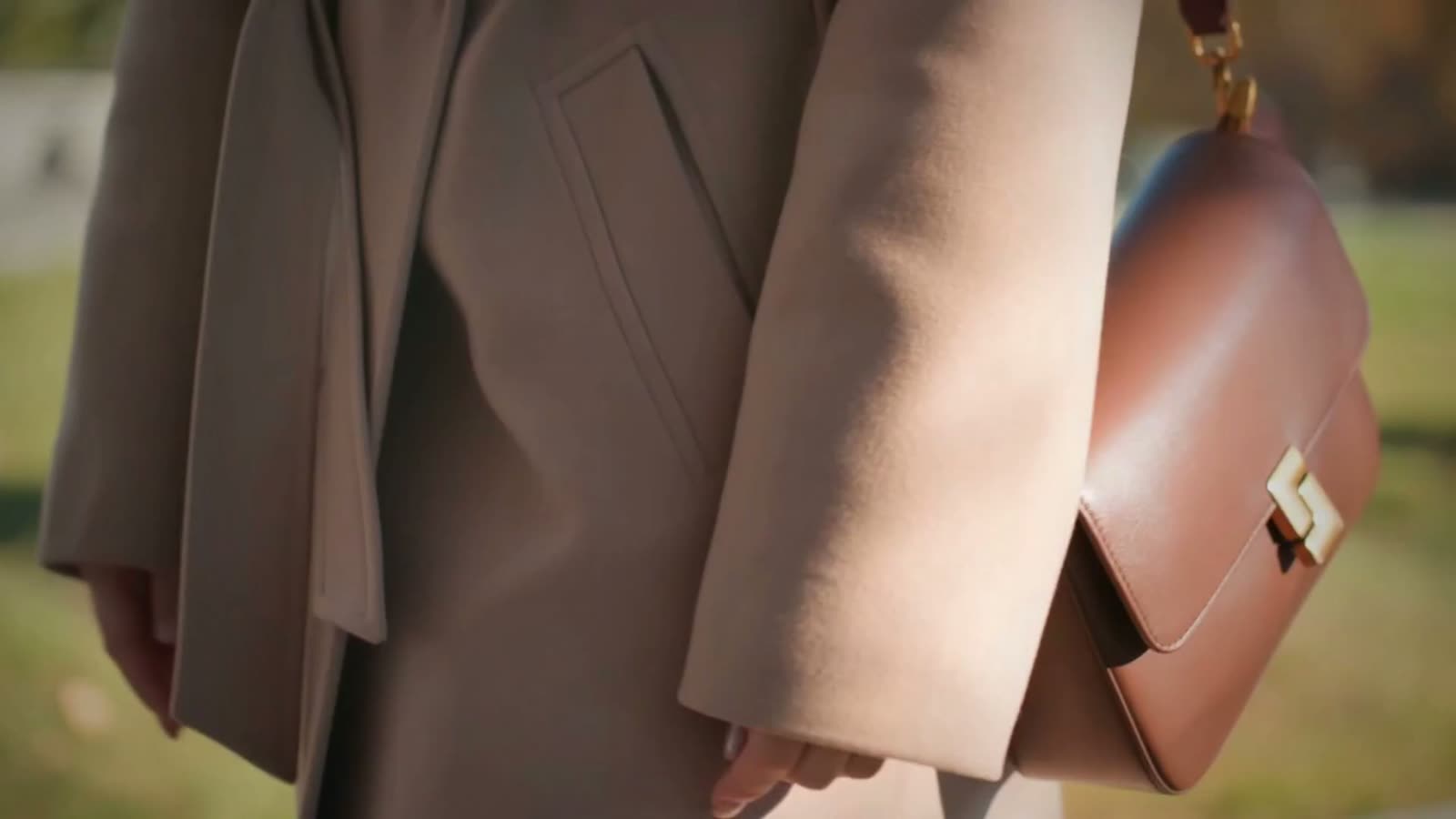 Angel Habit film showing polished tailoring and accessories in a bright architectural setting