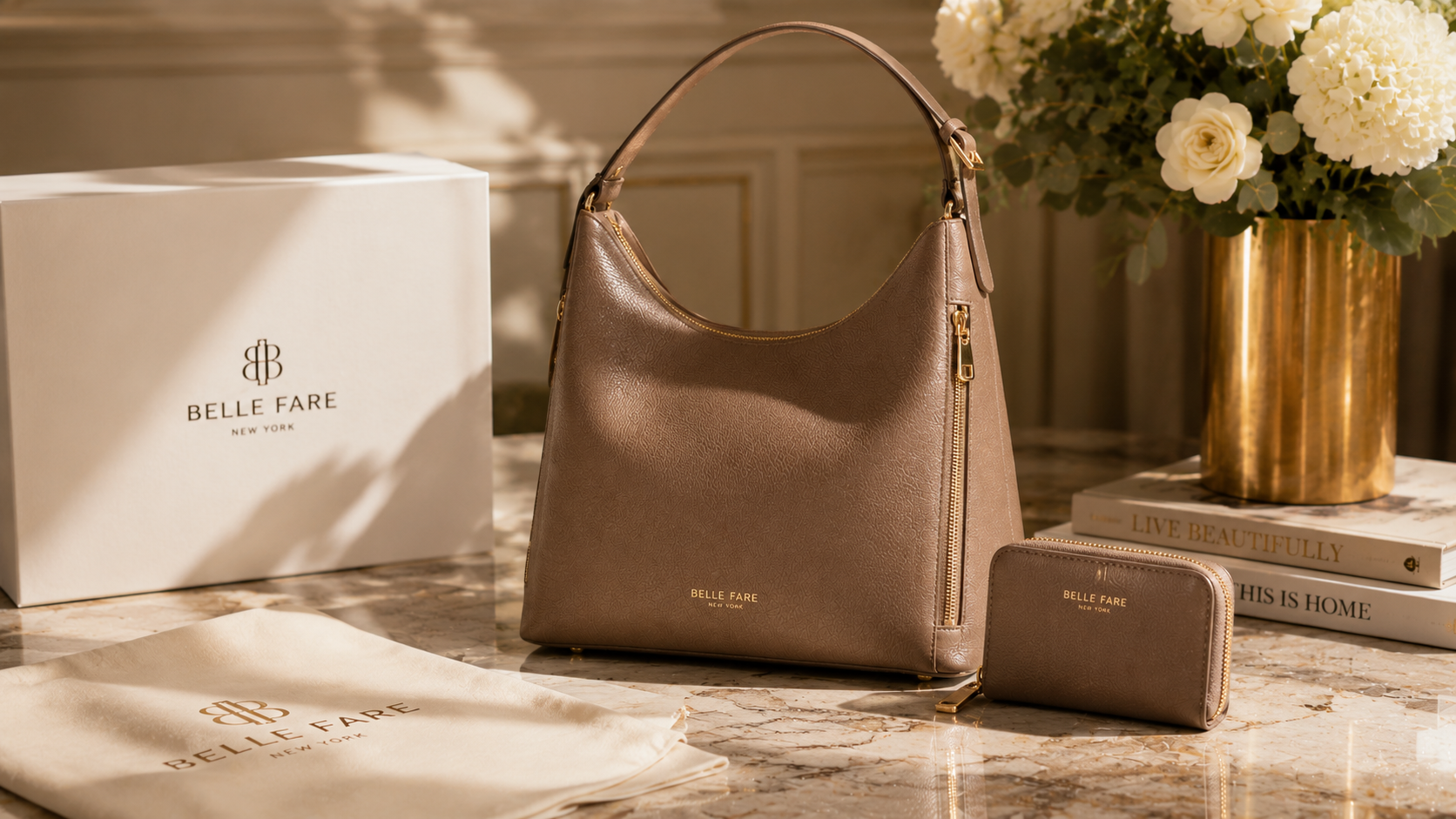 Taupe leather hobo bag and matching wallet displayed beside a Belle Fare box
